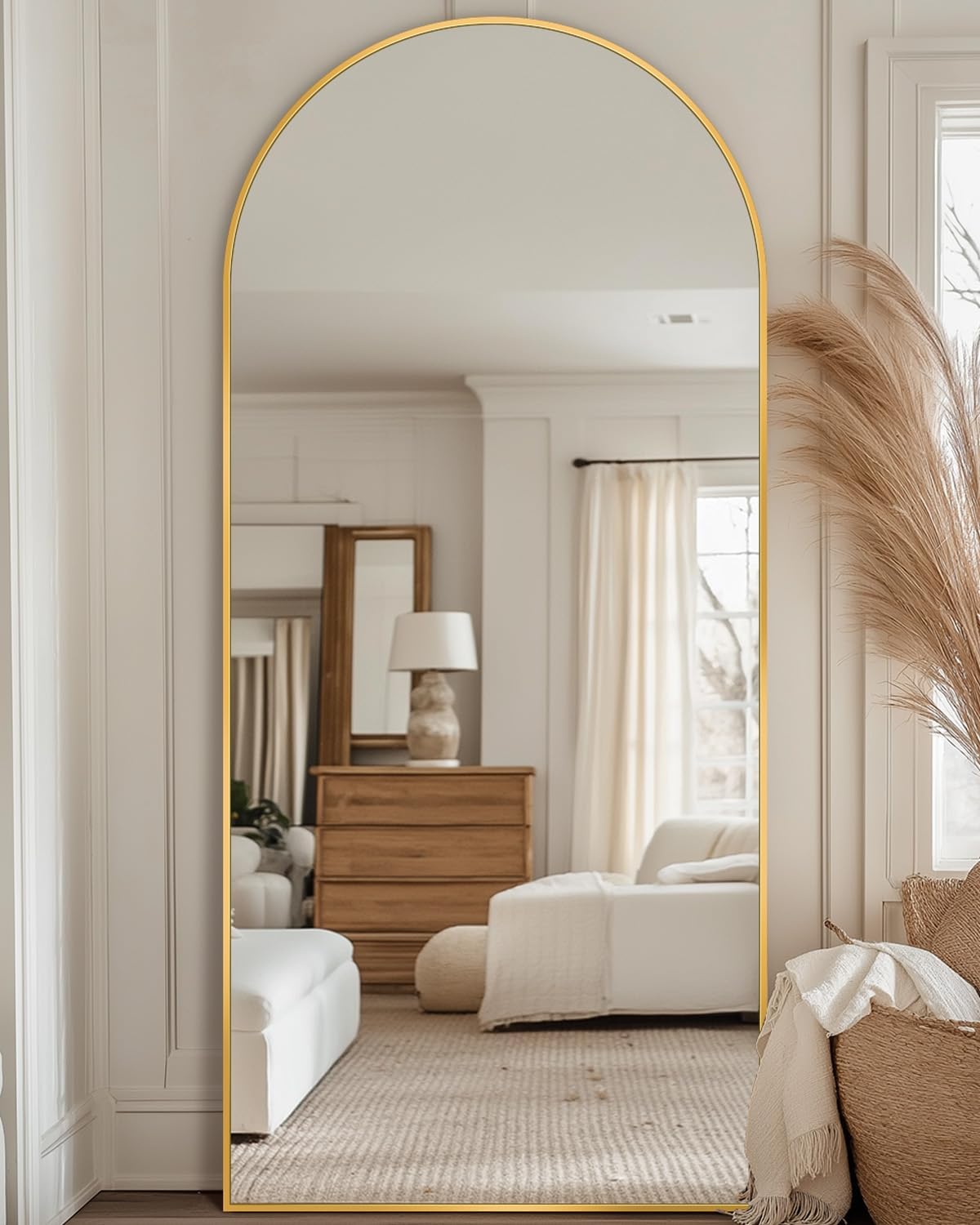 Antok front view of arched full-length mirror in modern room