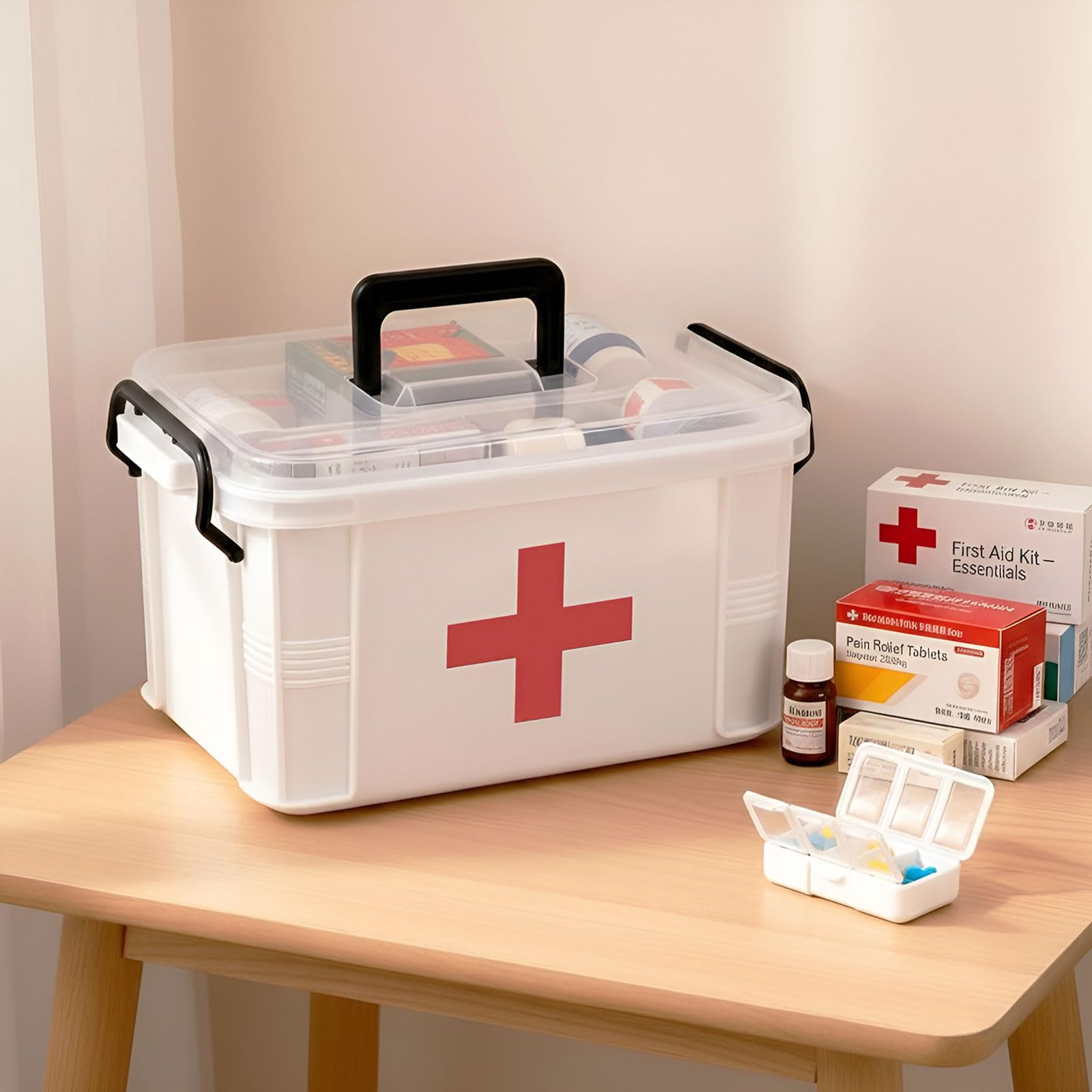 Large clear first-aid box stores vials and bottles with easy visibility.