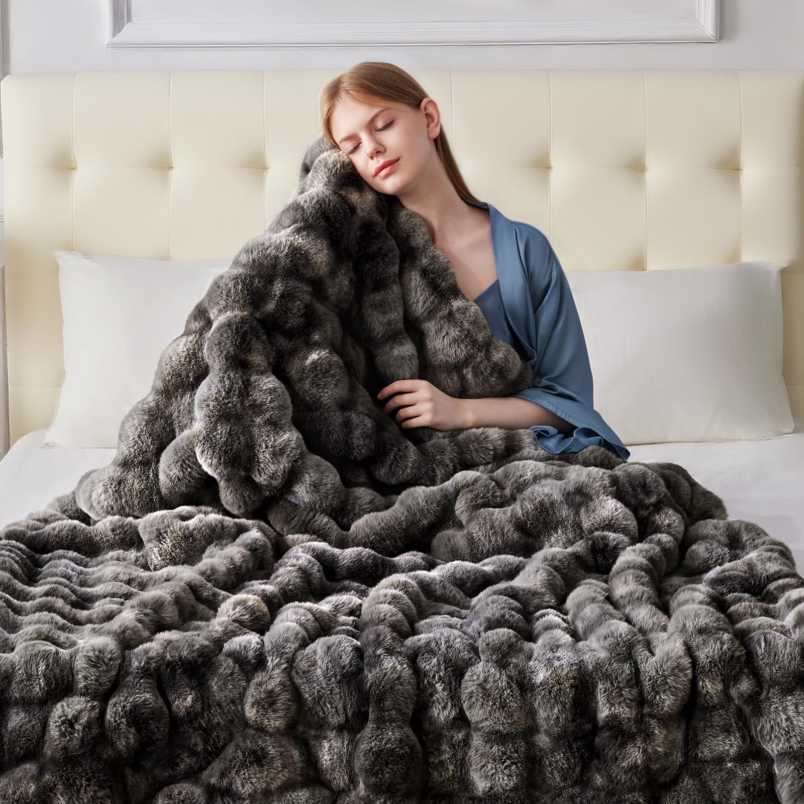 Anysay faux fur blanket shown on bed for cozy evenings.