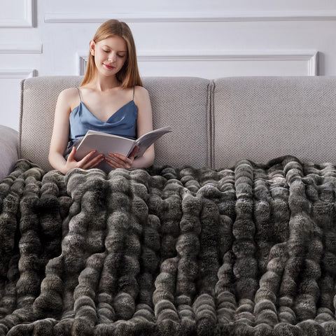 Anysay bubble-pattern throw blanket adds stylish texture to living space.