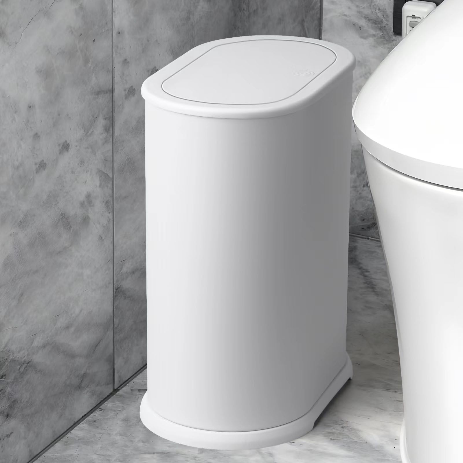 Anzoymx slim bathroom trash can fits tight spaces.