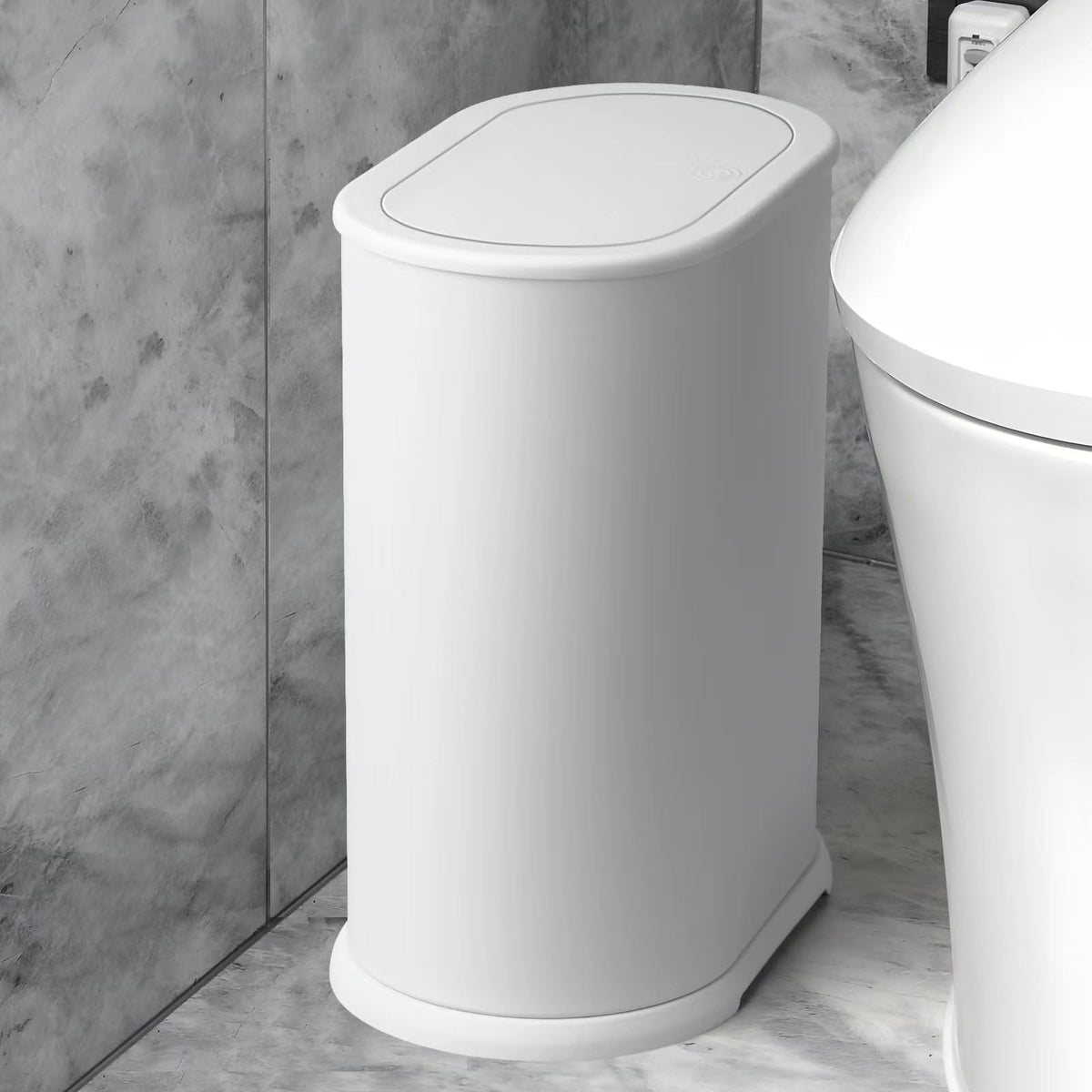 Anzoymx slim bathroom trash can fits tight spaces.