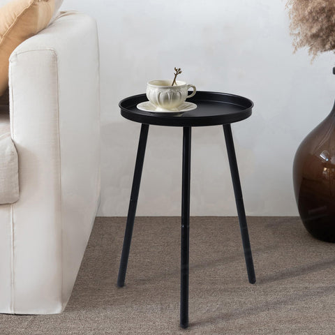 AOJEZOR bedside round table with compact footprint for small bedrooms.