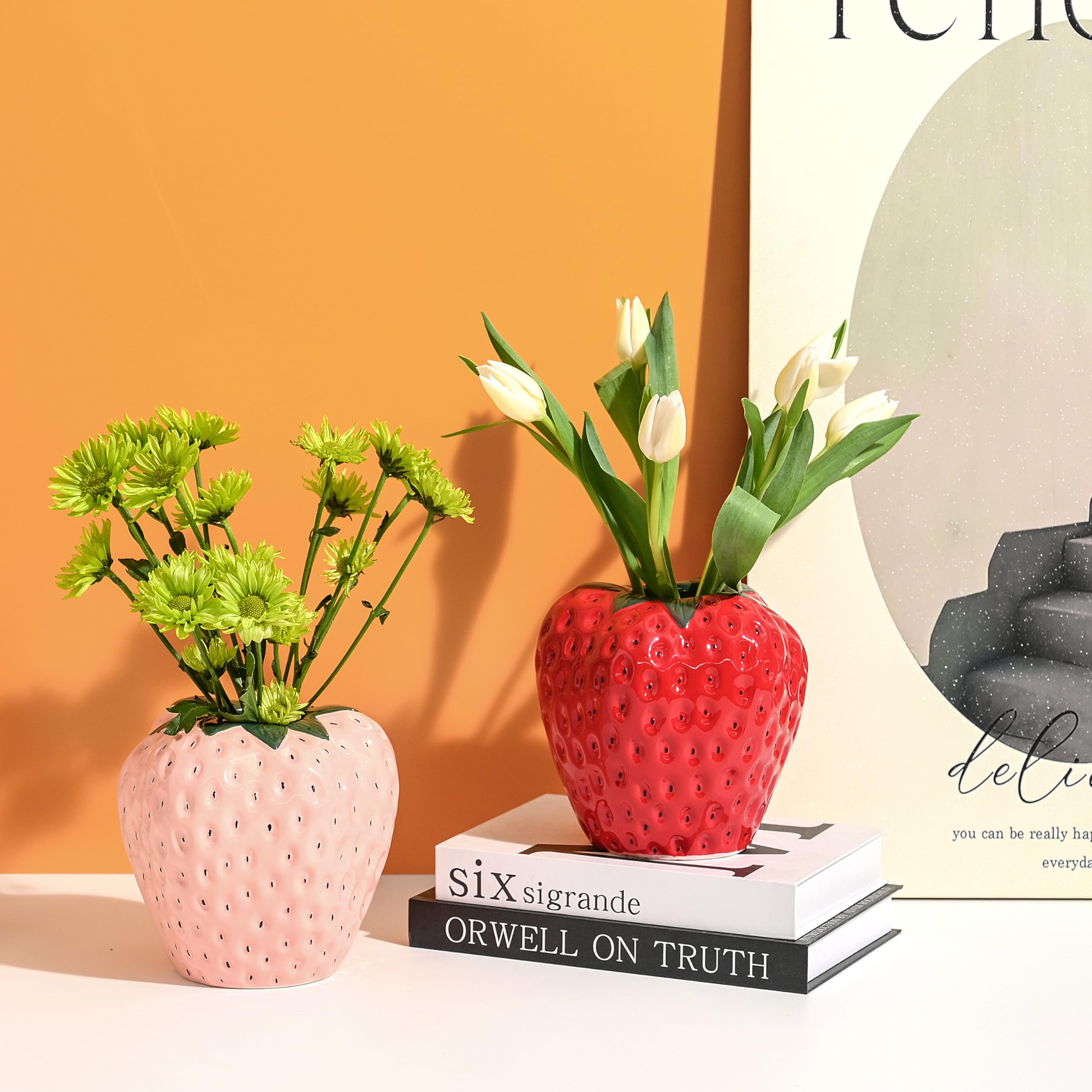 AOMOONOA vase with black seeds adds a playful focal point