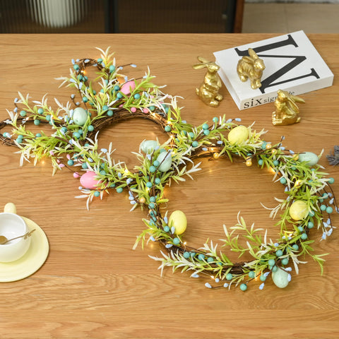 AOMOONOA wreath with 30 LED lights illuminating the bunny motif
