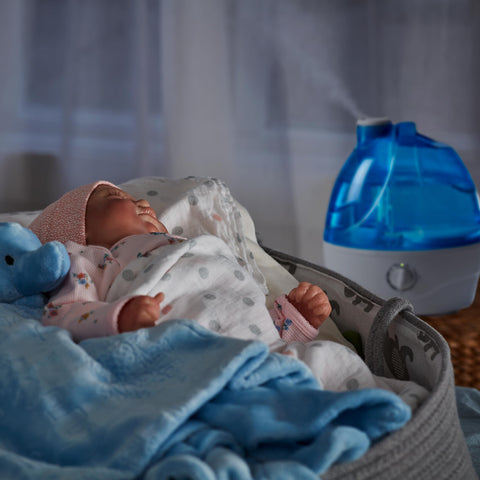 AquaOasis ultrasonic humidifier operates quietly for undisturbed sleep.