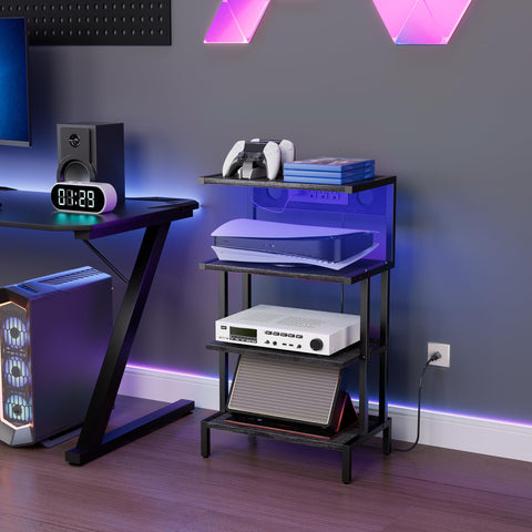 Aquzee four-tier media stand stores consoles, speakers, and devices neatly.