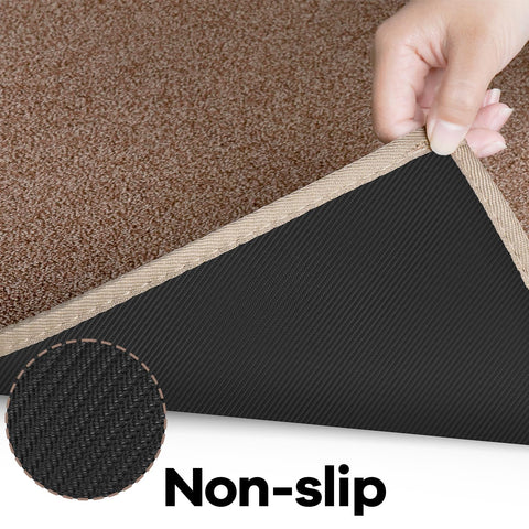 AREDO entryway rug offers solid color with low pile for quick cleaning.