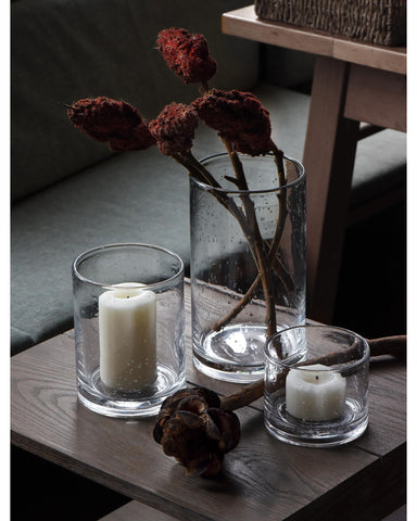 Hand blown glass cylinder by ARIAMOTION for modern farmhouse charm in living spaces.