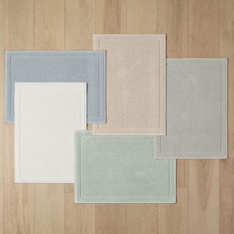 Arkwright hotel-ready rug provides guest-friendly aesthetics and quick-drying practicality