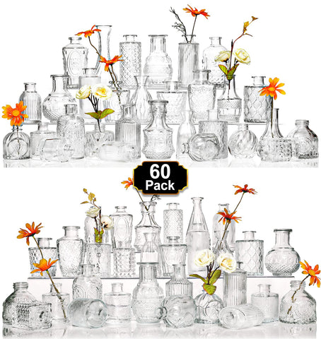 Arme glass bud vase set, 60 pcs, laid out for wedding centerpieces.