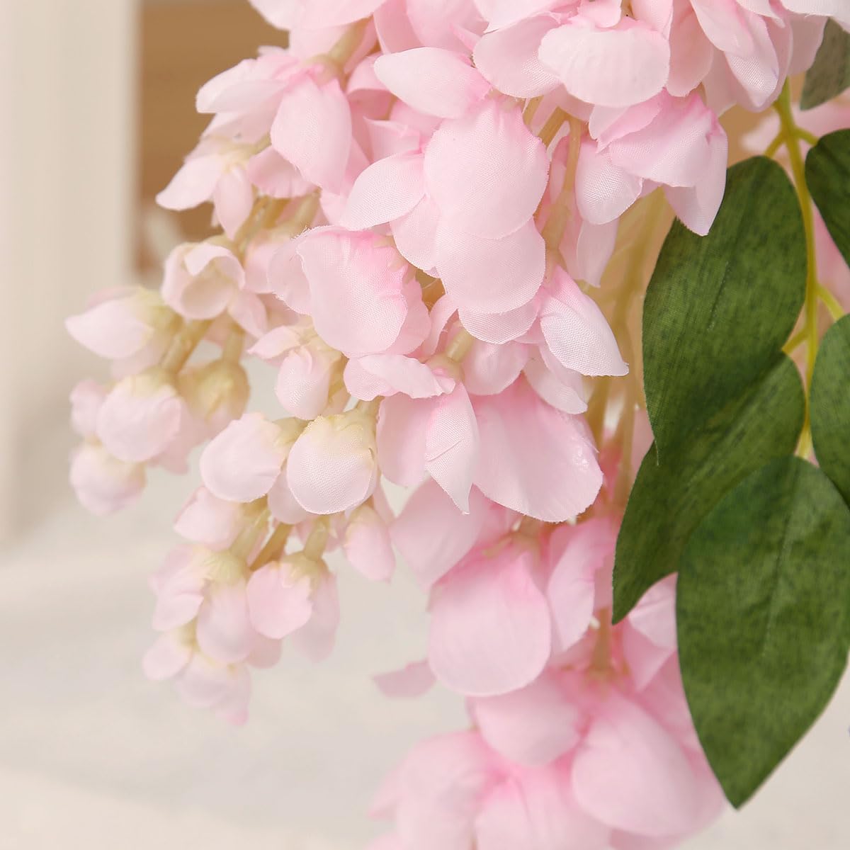 AROIUO wedding decor idea with flowing wisteria strands