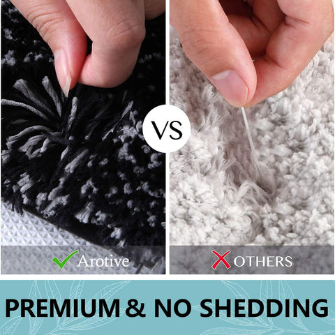 Arotive black 30x20 bath mat complements any bathroom setting.
