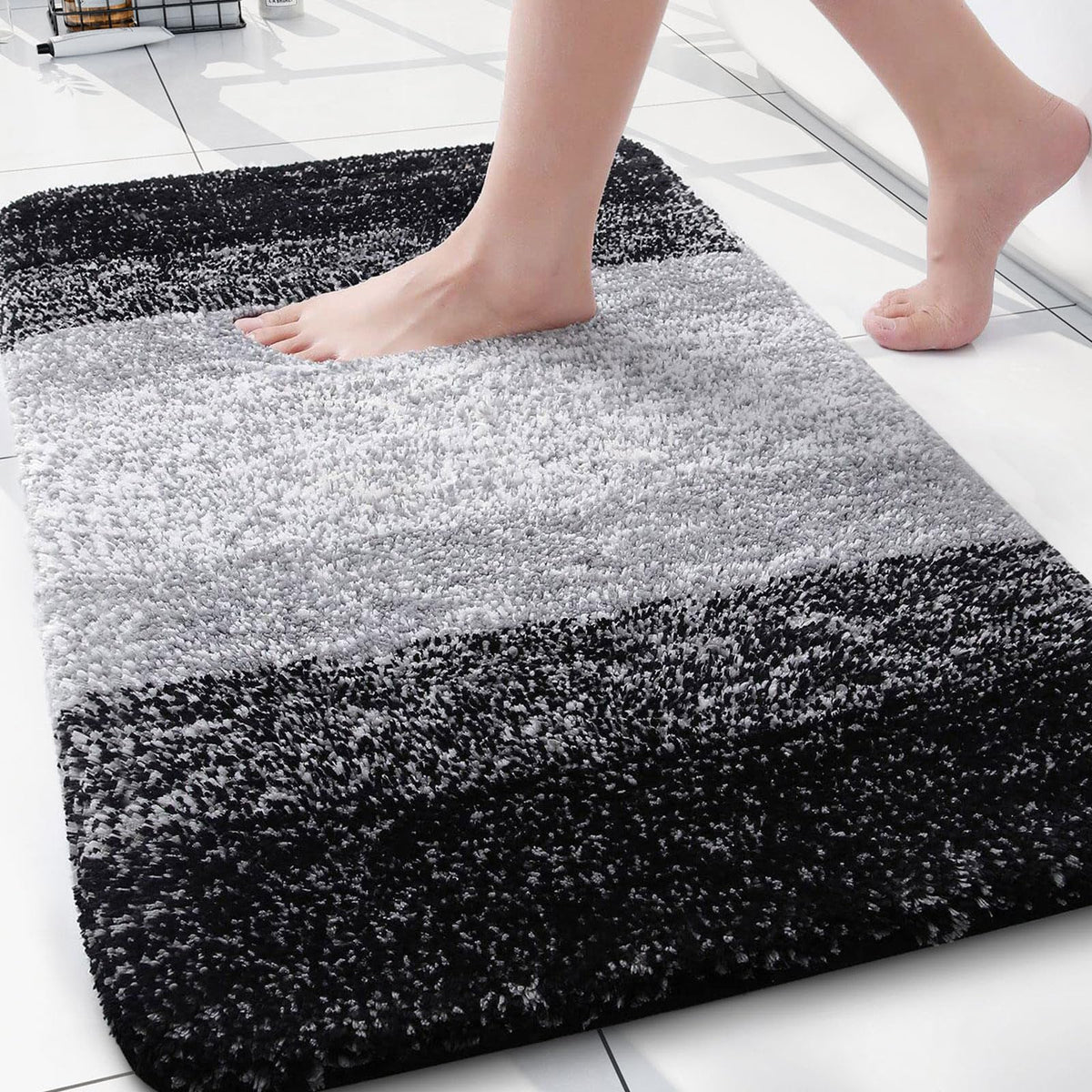 Arotive microfiber bath rug with soft pile for cozy feet and quick absorbency.