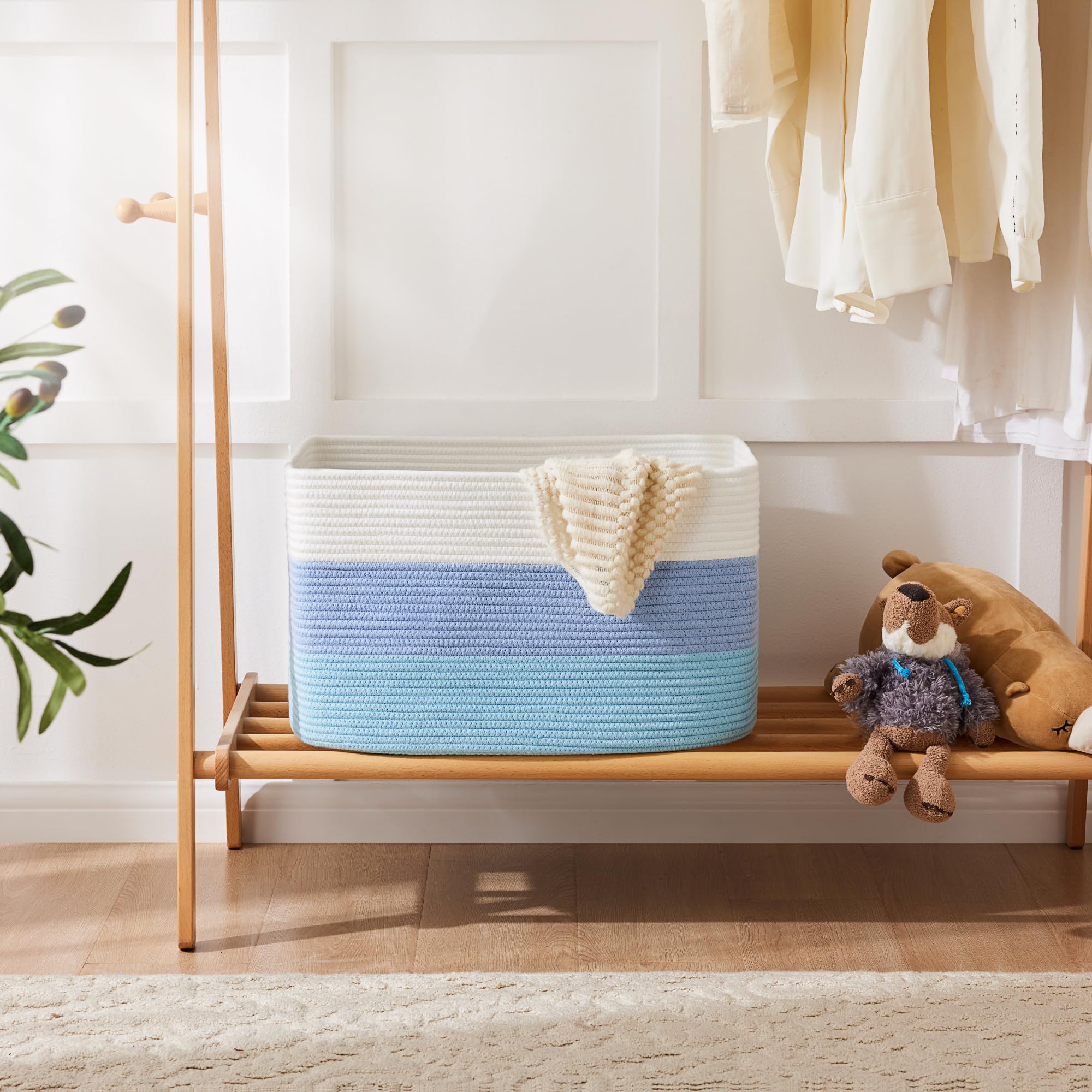 Artfeel toy and clothes basket keeps living room tidy and stylish.