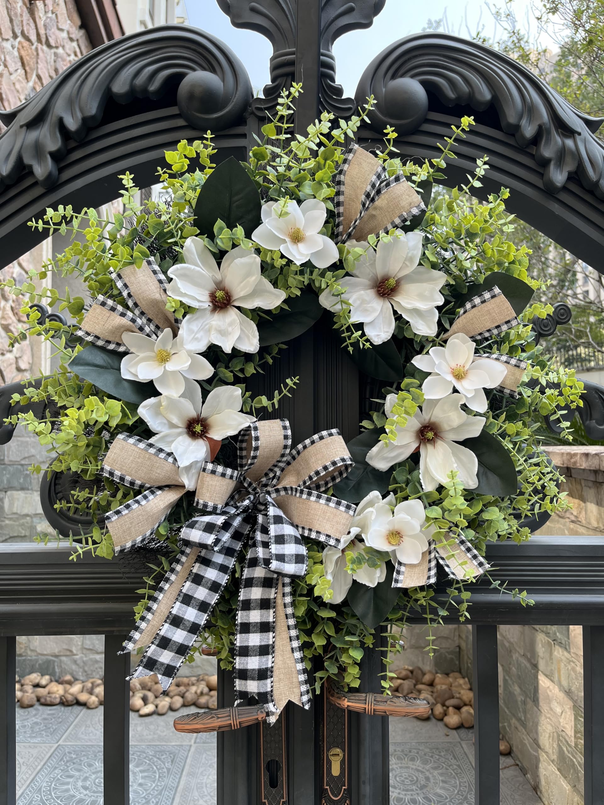 ARTINCRAFIO magnolia blooms with boxwood detail create lush wreath presence.