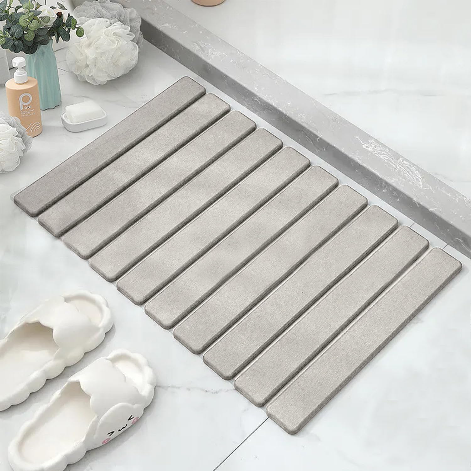 Asou Stone Bath Mat folded for compact storage and quick setup.