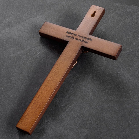 Asterom wall cross display measures twelve by seven inches.