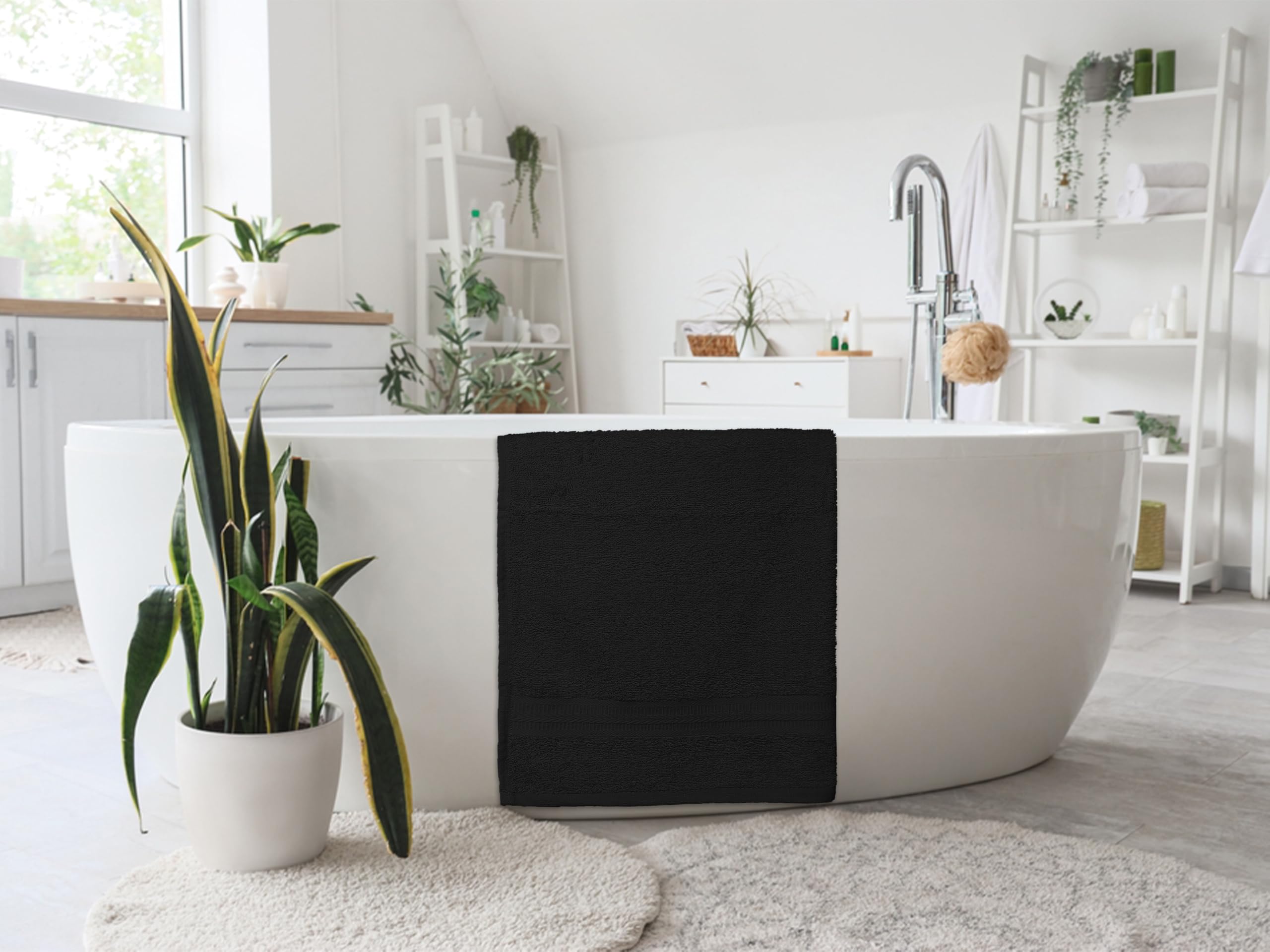 ASTILTEX 24x48 towel hanging on rack showcases absorbent, quick-drying fabric.