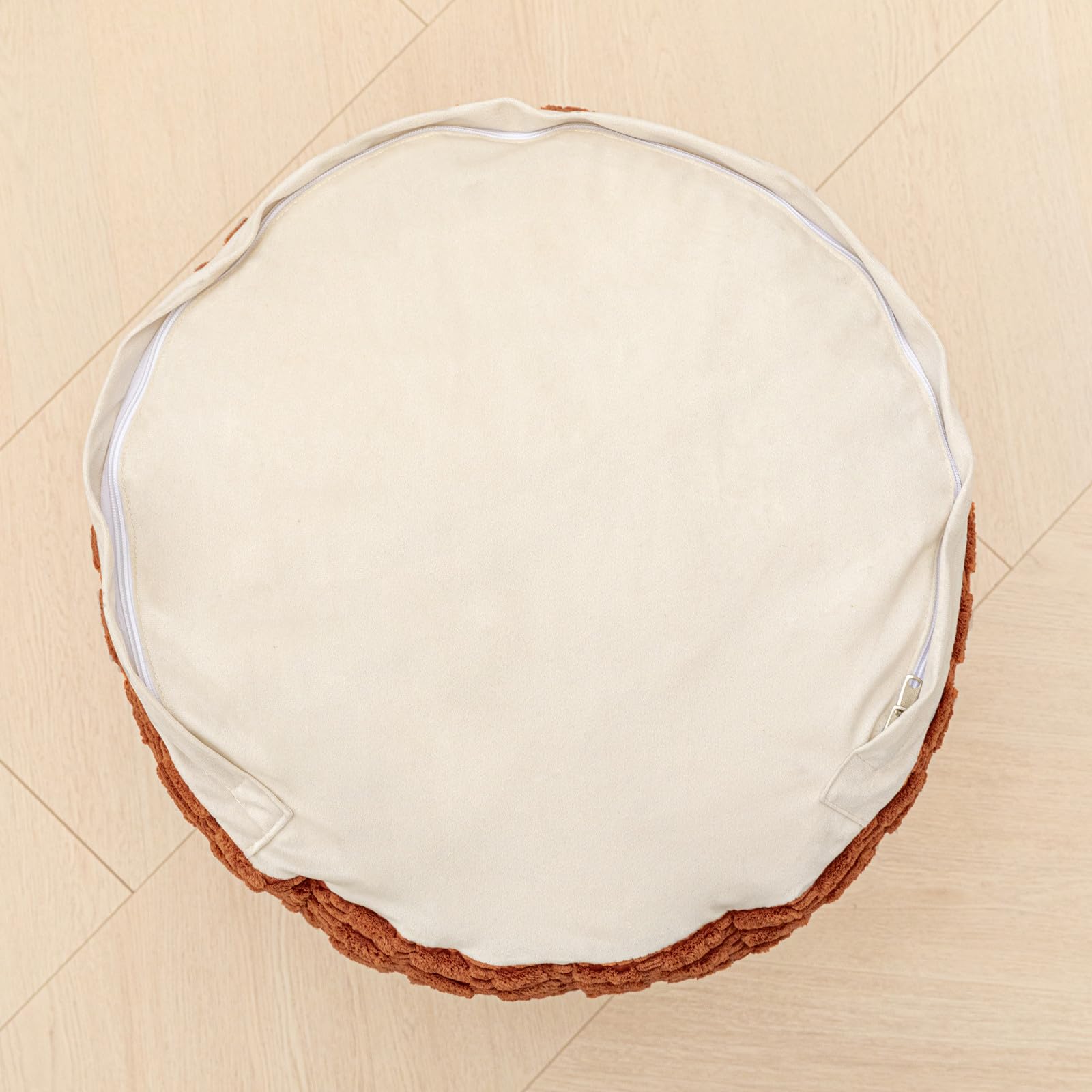 Asuprui pouf ottoman doubles as floor cushion and seating option.