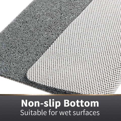 Asvin bath mat features drain holes for quick drainage and drying.