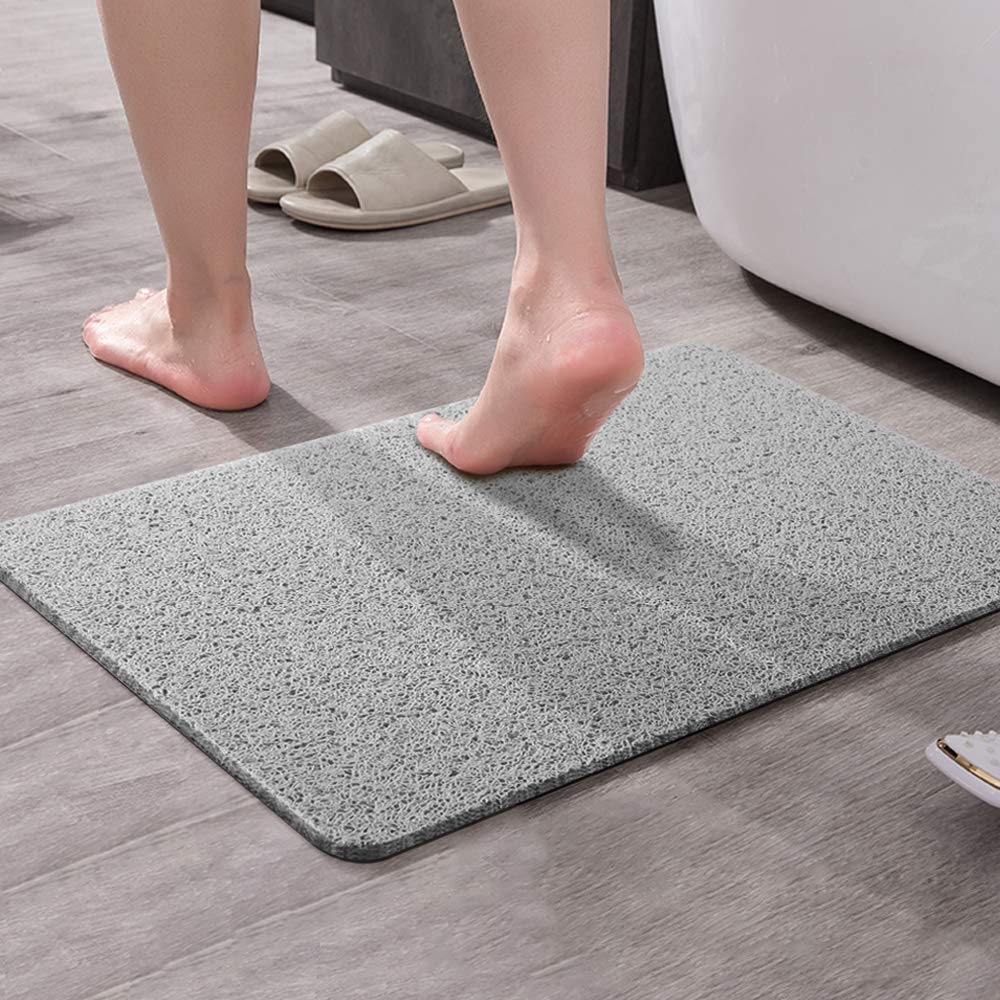 Asvin non-slip bath mat close-up showing textured surface for grip.