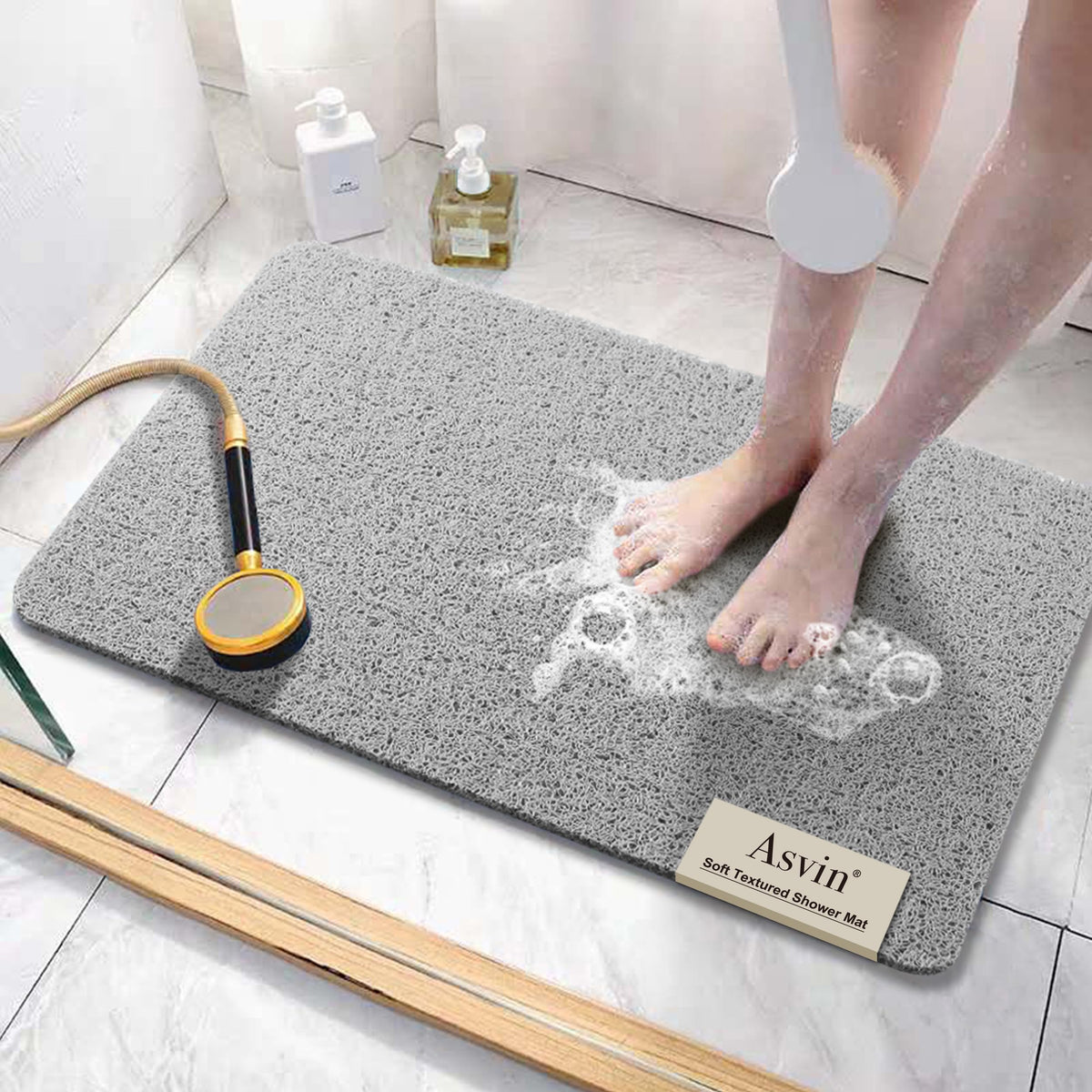 Asvin soft textured bath mat with non-slip surface for safer tub use.