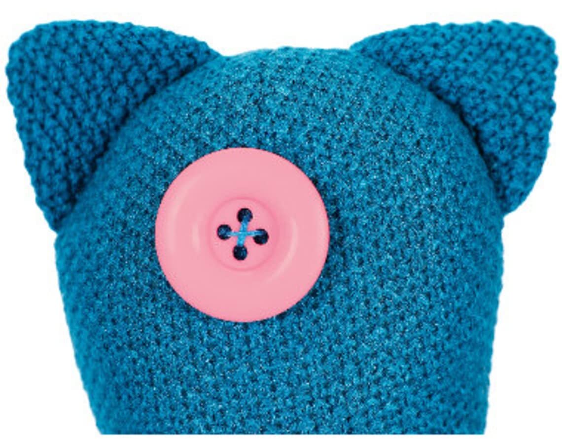 ASVP Shop Coraline crocheted octopus, eye-button detail, ideal fandom gift.