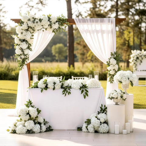 Auihiay dining table decor with ivory hydrangea accents.