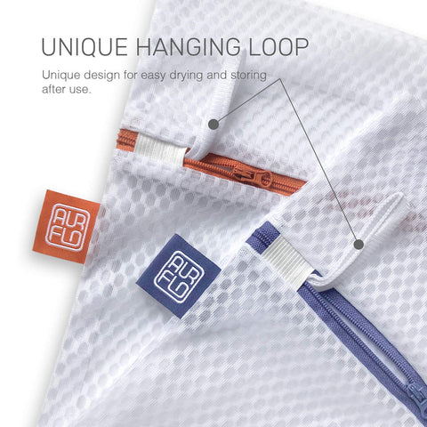 Color-coded laundry bag system helps sort laundry and prevent mix-ups.