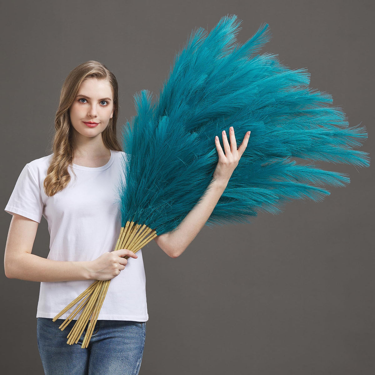 Aurora Prime blue pampas grass seven-stem display adds height to floor vases.