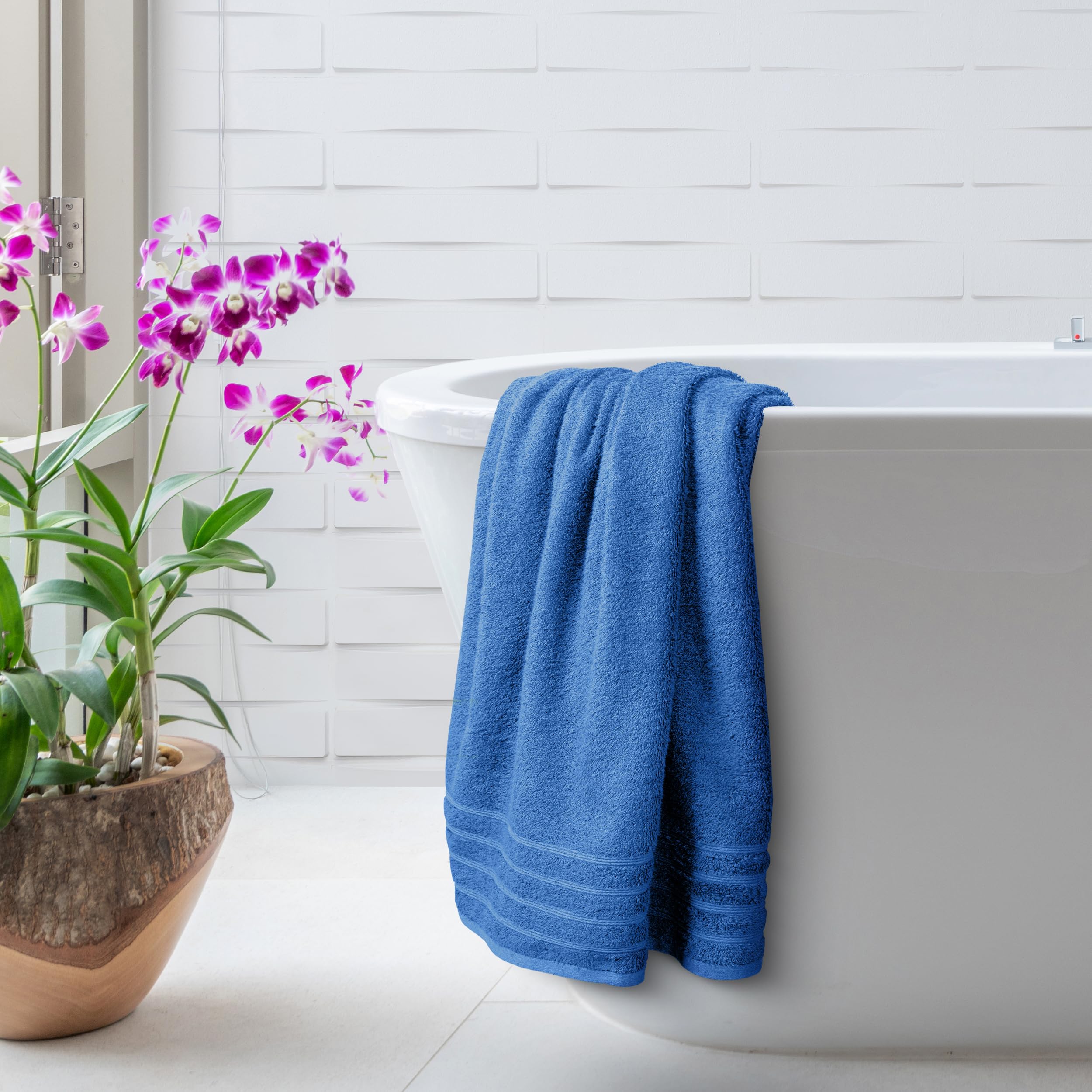 Avalon Towels 30x60 inch size in bathroom demonstrates generous coverage.