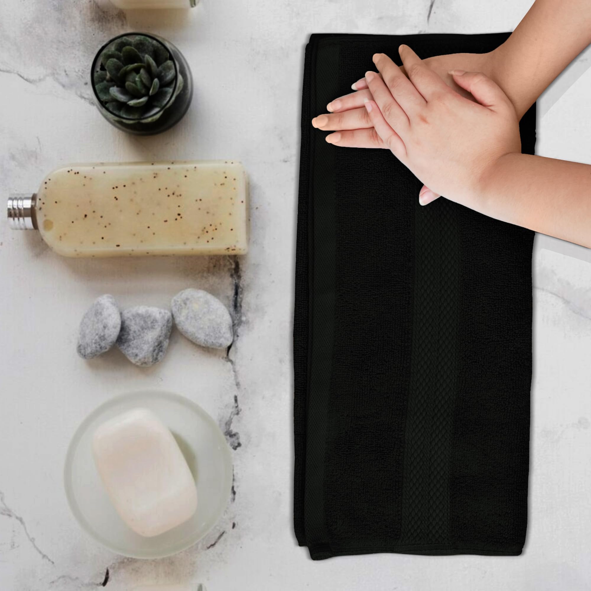 Avalon Towels black hand towels showcase hotel-style set for modern bathrooms.
