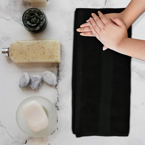 Avalon Towels black hand towels showcase hotel-style set for modern bathrooms.