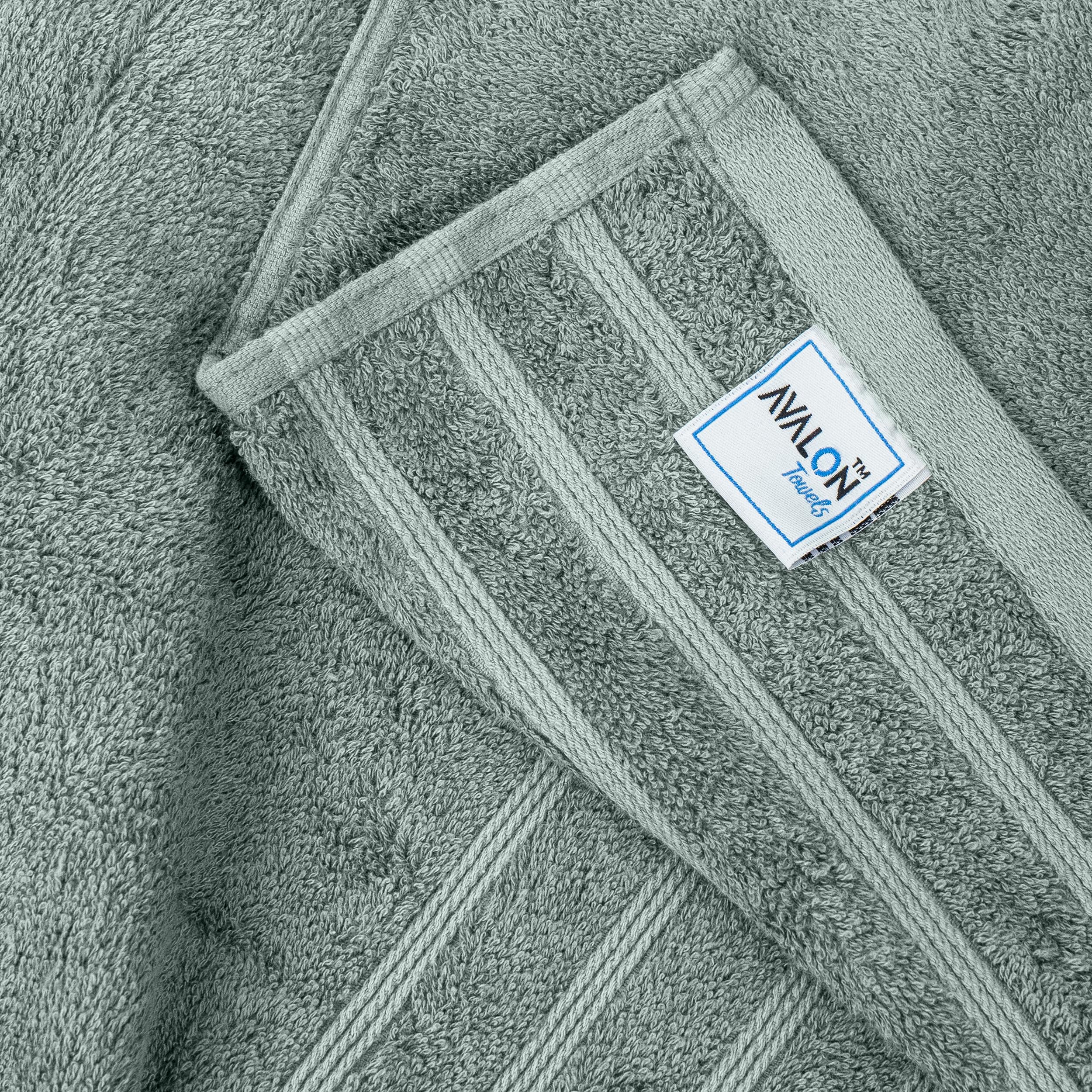 Avalon Towels draped on a bath rack for a luxurious look