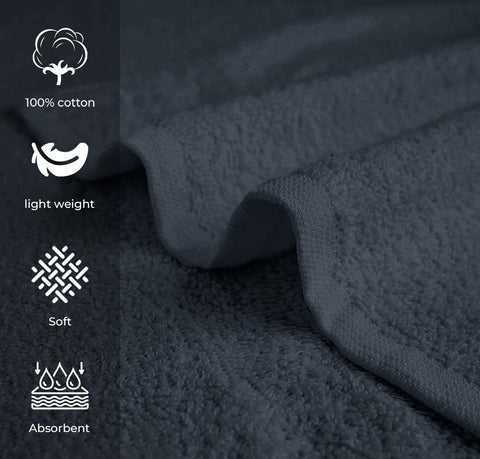 Avalon Towels bulk-pack display of grey salon towels, ideal for high-traffic spaces.
