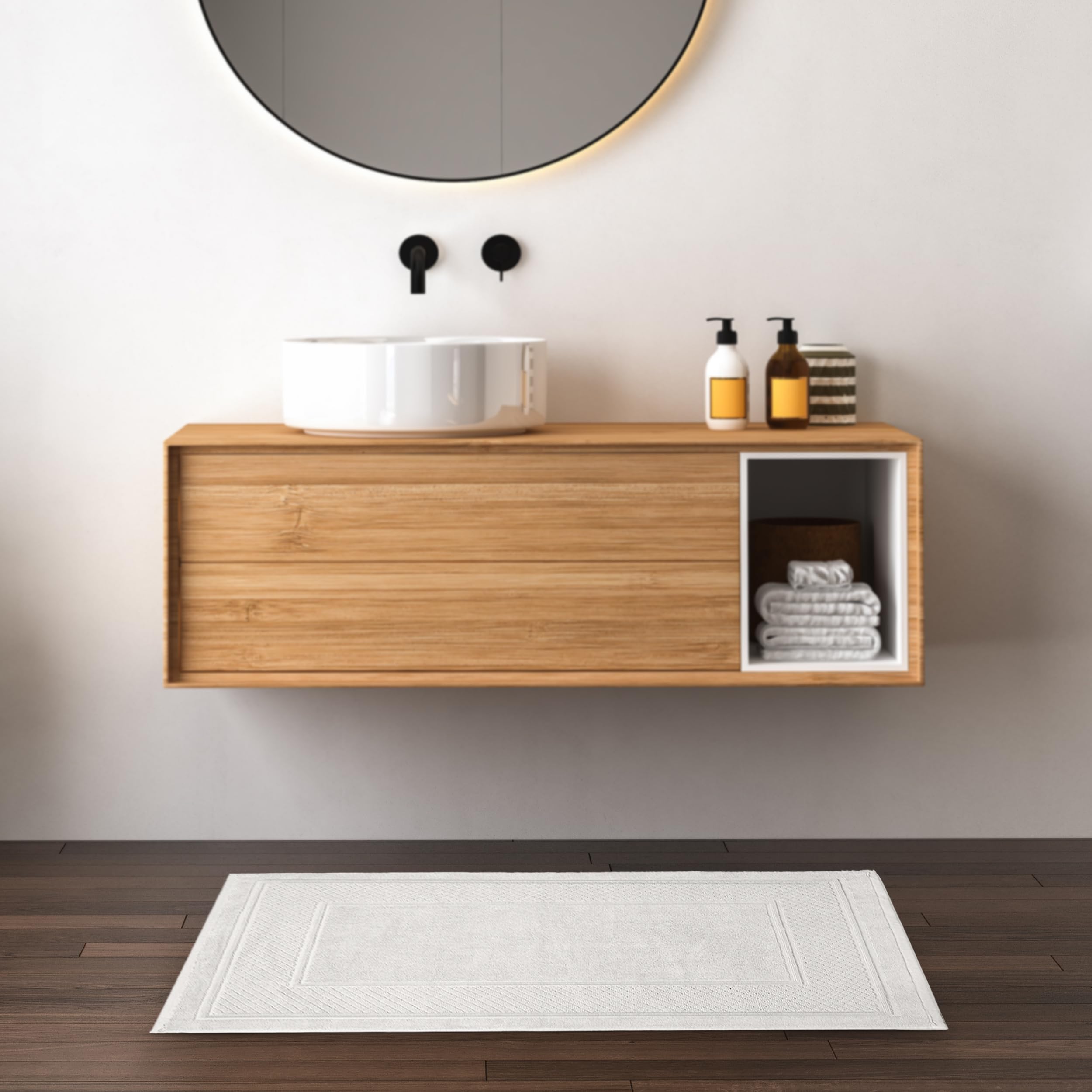 Avalon Towels White Bath Mat double-stitched edges ensure lasting comfort