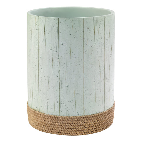 Avanti Beachcomber wastebasket highlights aqua backdrop and resin finish.