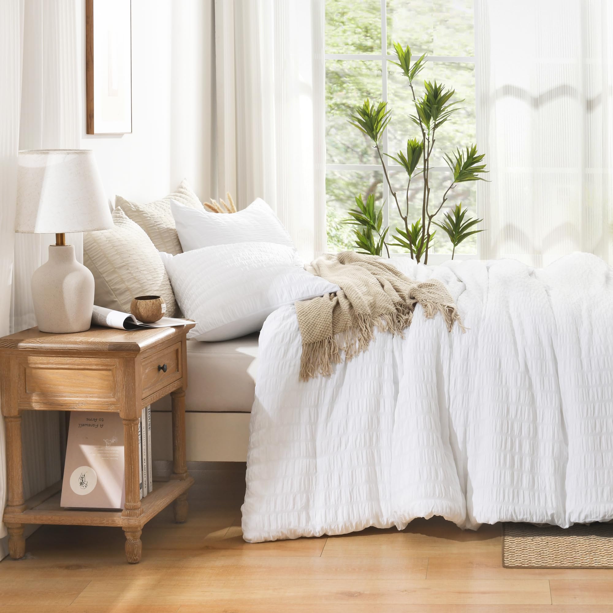 Avelom Seersucker King Comforter Set in a dim room for a serene look.