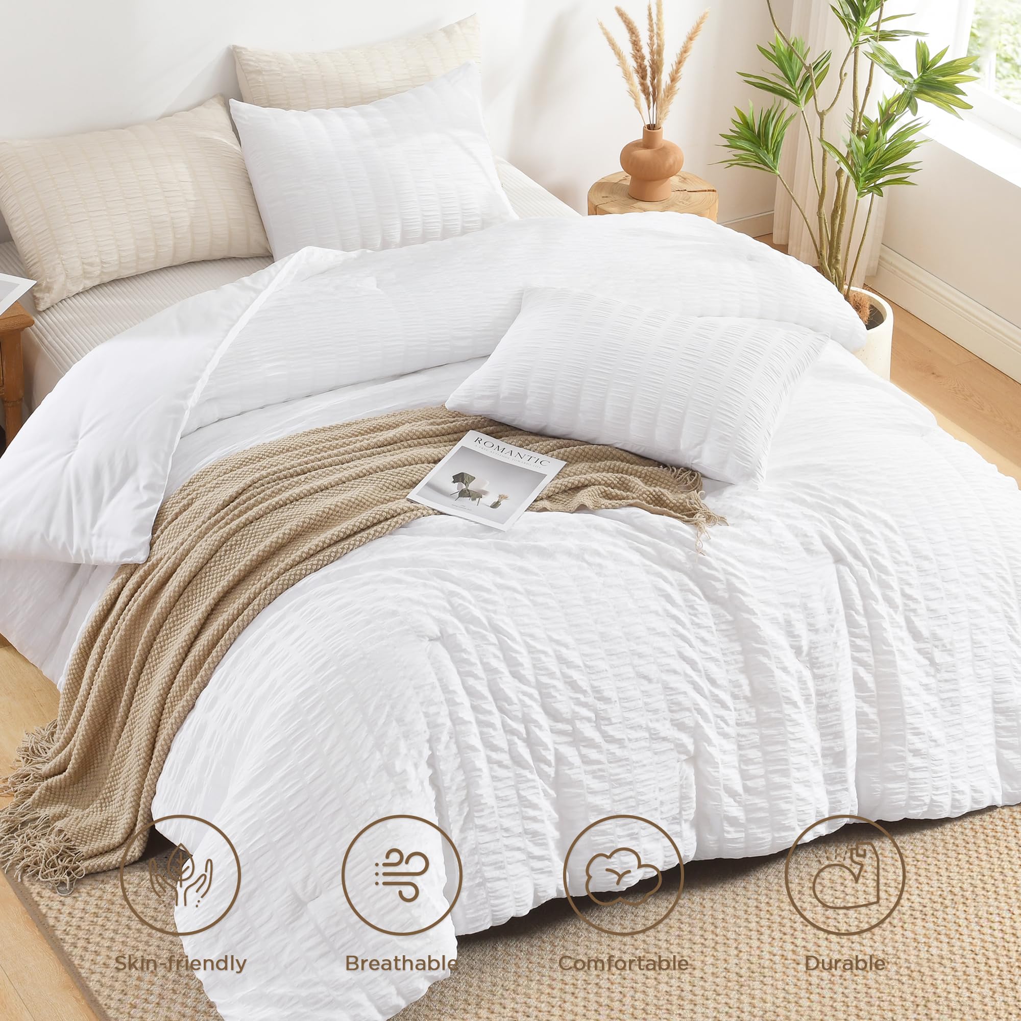 Avelom Seersucker King Comforter Set draped on bed with crisp white color.