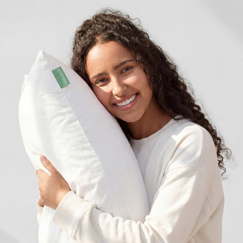 Machine-washable zip cover for easy care on the Avocado pillow.