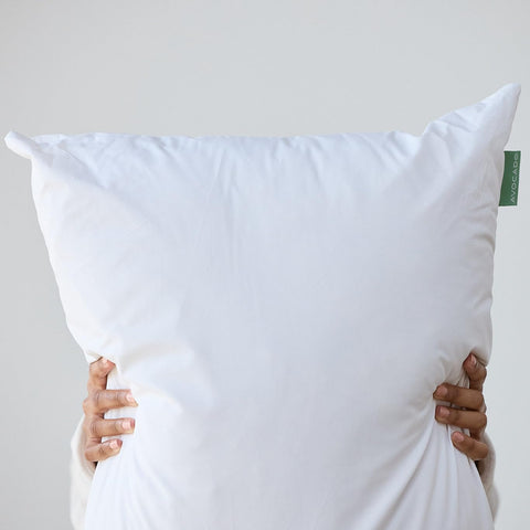Side profile of the Avocado pillow showing balanced head and neck support.
