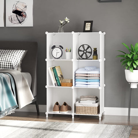 AWTATOS cube storage in a bedroom setup highlighting spacious cubes for clothes and books.