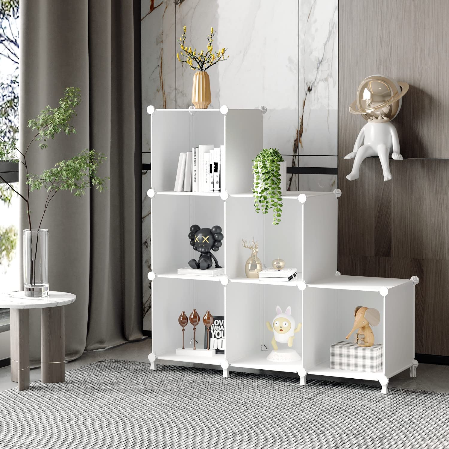 AWTATOS cube storage stack layout shows modular interlocking panels for stability.