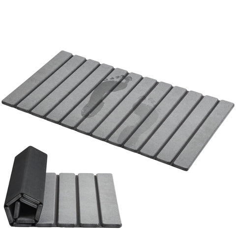 AWW foldable stone bath mat with quick-dry surface on tile floor