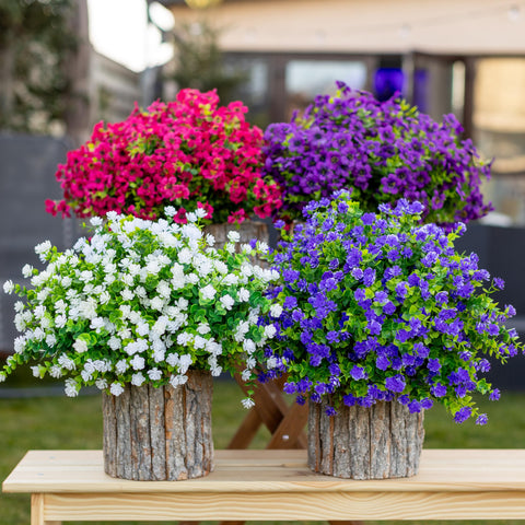 AXYLEX outdoor decor setup with faux greenery accents