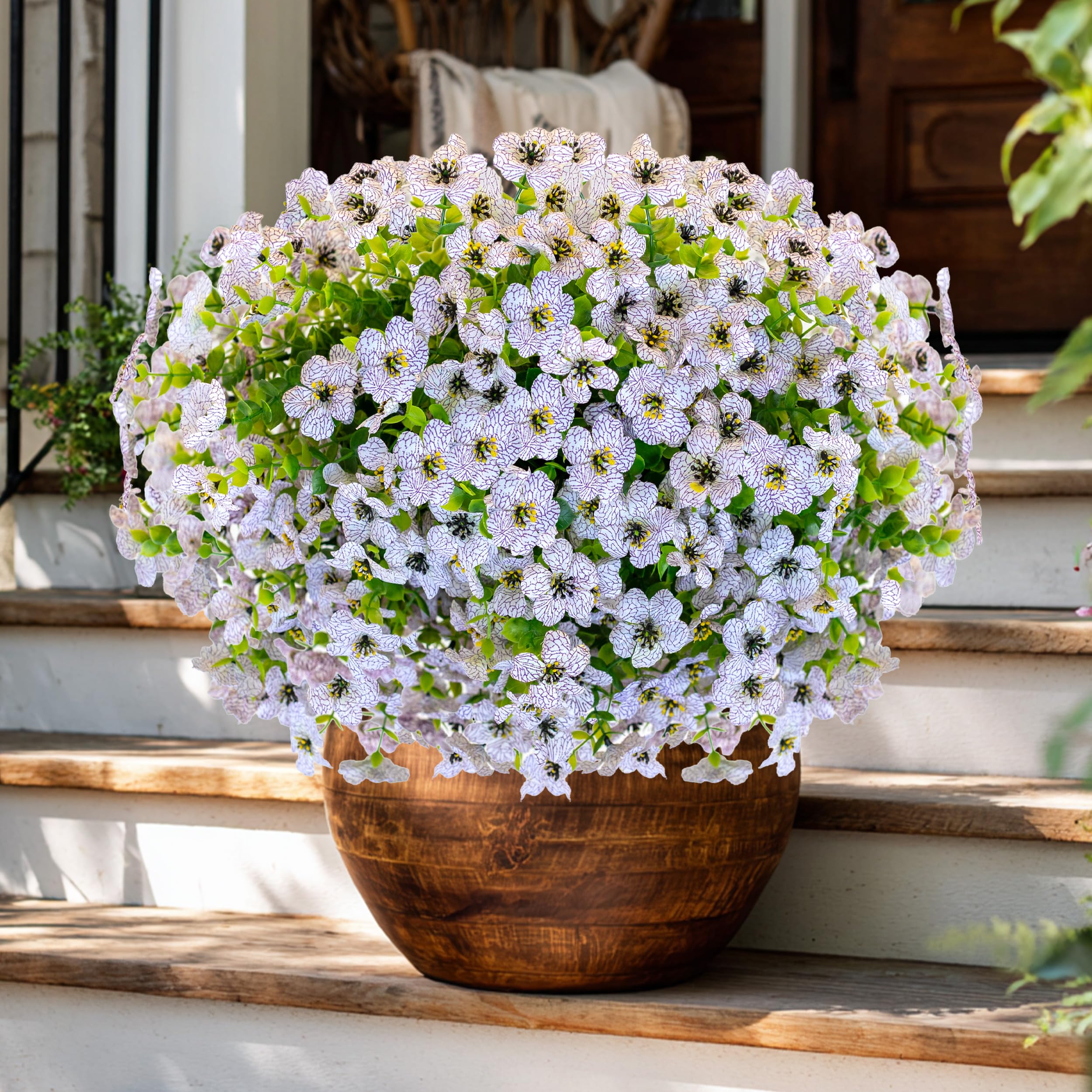 AXYLEX fade-proof faux shrubs maintain vibrant color through changing seasons outdoors.
