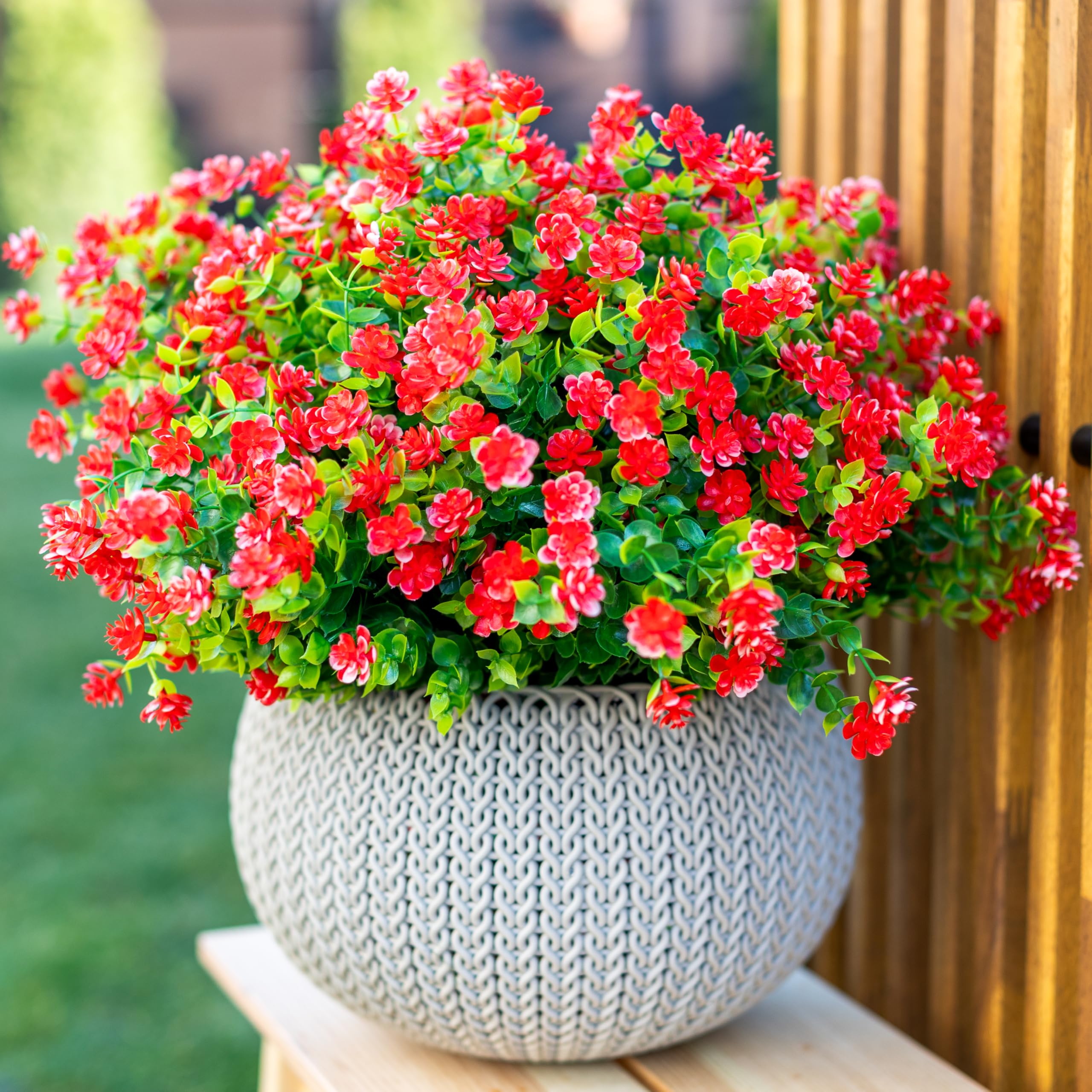 AXYLEX red faux greenery for outdoors enhances privacy on porches and balconies.