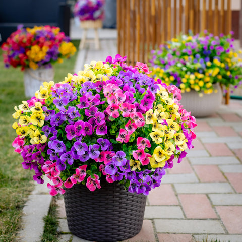 AXYLEX artificial greenery balance complements outdoor seating while staying vibrant