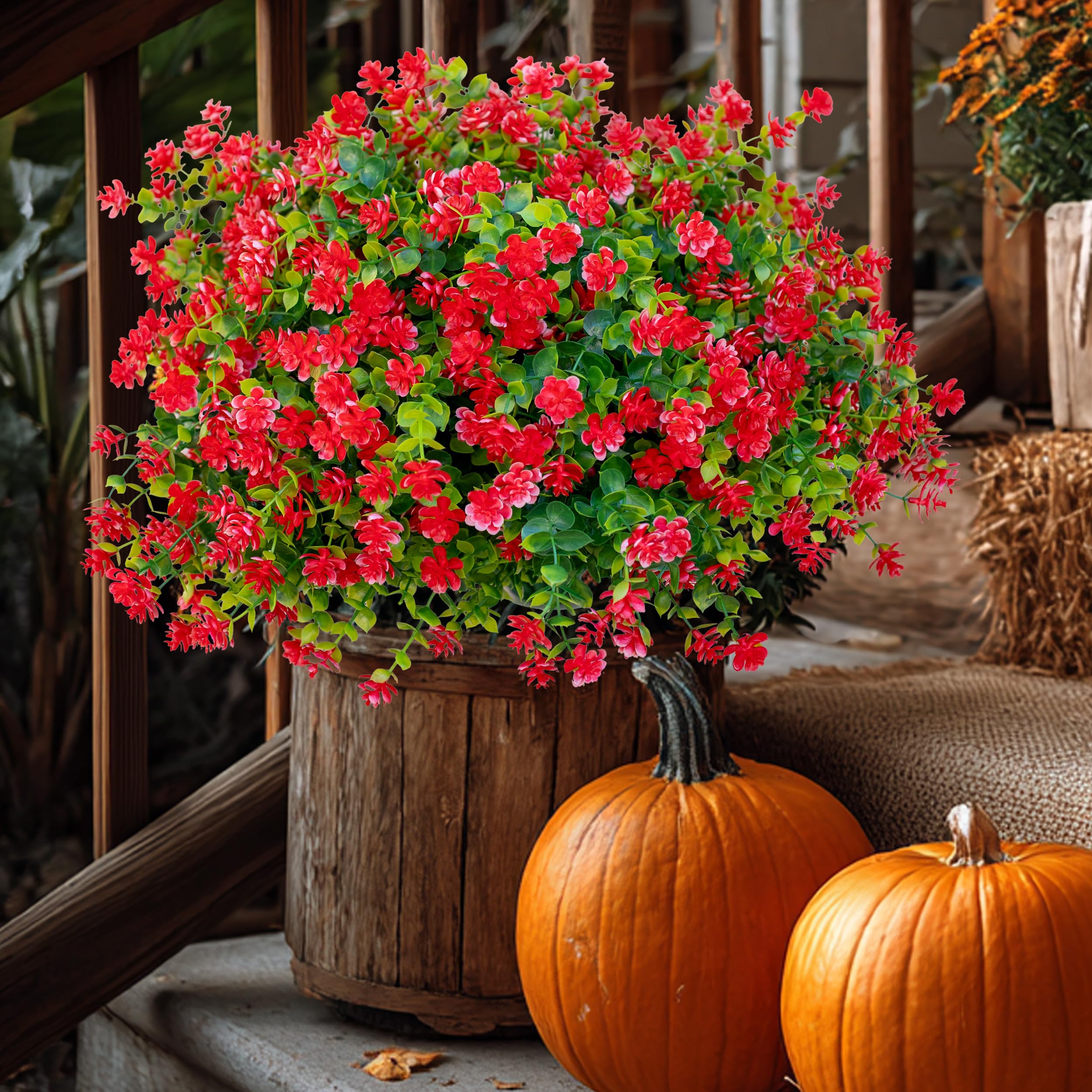 AXYLEX outdoor fake plants brighten entryways with lush color.